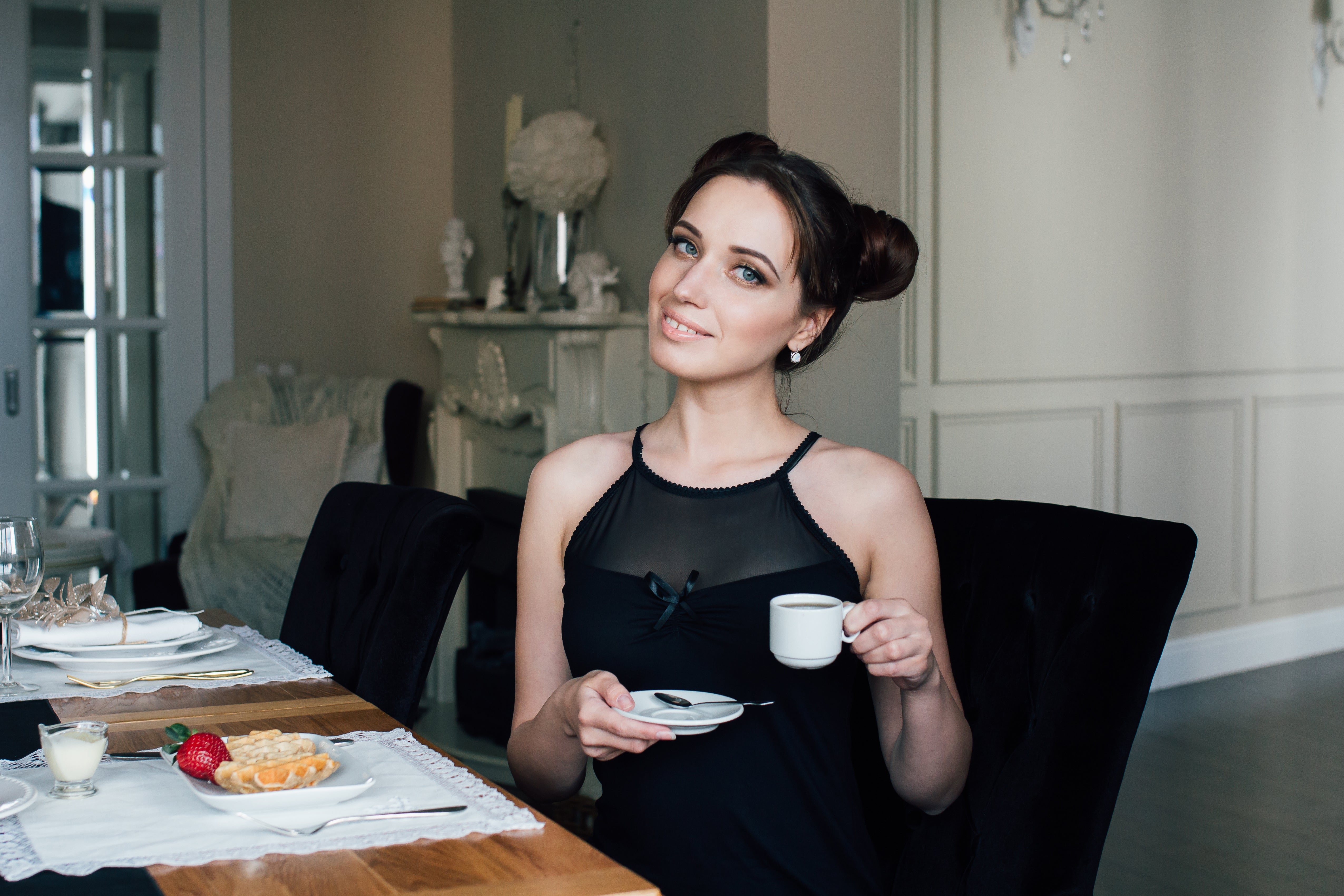 elegant-woman-drinking-coffee-in-a-beautiful-home-2026-04-15-05-16-10-utc.jpg